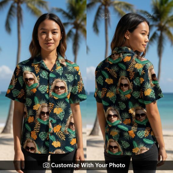 Woman in black Hawaiian shirt with colorful tropical leaves and hibiscus flowers