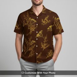 Man in brown Hawaiian shirt with vibrant yellow coral print, island vacation style