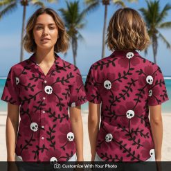 Woman wearing a burgundy Hawaiian shirt with skull floral print, black and white accents