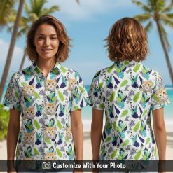 Hawaiian shirt with cat face print worn by woman, palm leaves and navy flowers at beach
