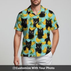 cat hawaiian shirt turquoise banana print worn by man at beach party
