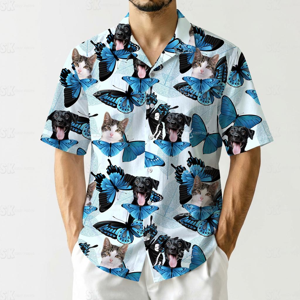 Fabric mens hawaiian cat shirt showing dog faces, cat faces, blue butterflies on light background