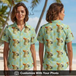 Hawaiian shirt with cockatoo parrot face print worn by woman at beach sunset