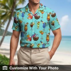 cocktail hawaiian shirt turquoise with tropical drinks worn by man at sunset