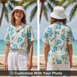 cocktail hawaiian shirt blue hibiscus and seashell print worn by woman at beach
