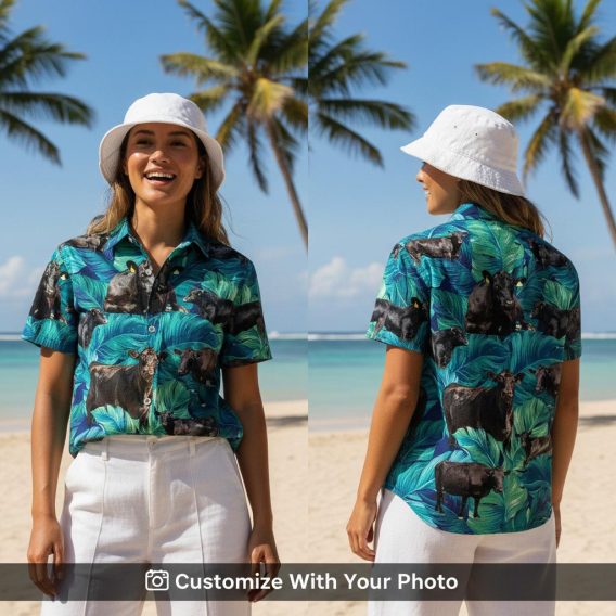cow hawaiian shirt with black cows and teal leaves worn by woman at sunset beach