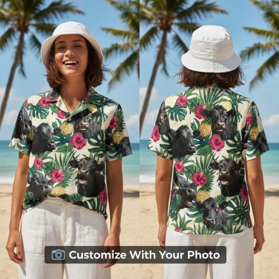 cow hawaiian shirt with pink flowers and pineapples worn by woman outside