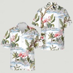 Cat hawaiian shirt displaying tropical scene with pink flamingos green plants water waves background