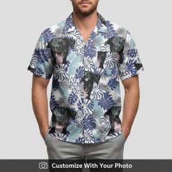 custom dog face hawaiian shirt with tropical leaves on man at sunset
