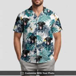 Man in custom dog Hawaiian shirt, white top with black dog and orange floral accents