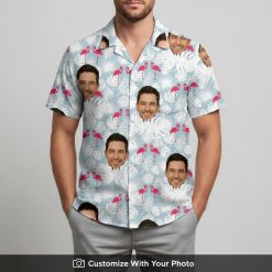 Man in custom flamingo aloha shirt featuring pink flamingos and white leaf pattern