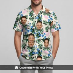 Man in custom flamingo Hawaiian shirt with face design, tropical leaves, blue flowers