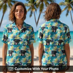 custom hawaiian dog shirt with playful dog faces worn by woman at sunset beach