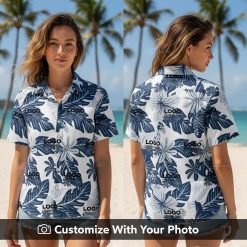Woman wearing custom Hawaiian shirt with navy and white tropical foliage design