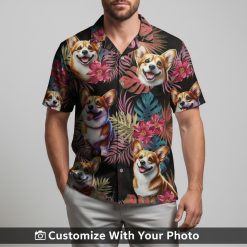 dog hawaiian shirt with corgi illustrations and teal leaves on man seaside