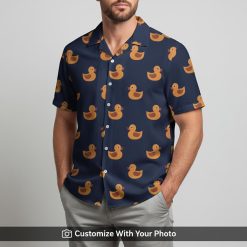duck hawaiian shirt navy with orange rubber ducks worn by man outdoors