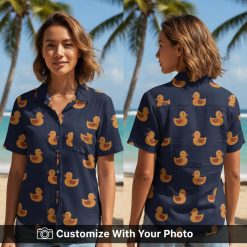 duck hawaiian shirt with orange rubber ducks worn by woman in sunny park