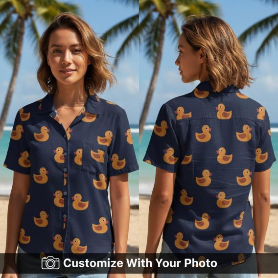 duck hawaiian shirt with orange rubber ducks worn by woman in sunny park