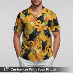 halloween black cat hawaiian shirt jack o lanterns worn by man at sunset