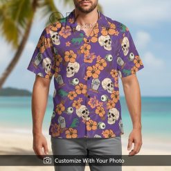 halloween hawaiian shirt with orange hibiscus and skeleton worn by man outdoor