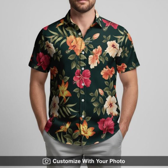 Man in Hawaiian floral shirt with bold red and yellow flowers and green leaves