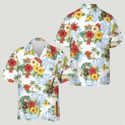 Hawaiian tropical print shirt showing red yellow hibiscus palm trees surfboards blue background