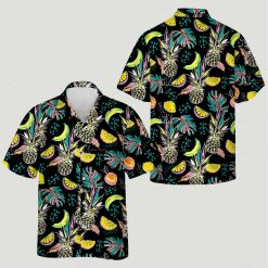hawaiian print shirt womens style featuring tropical fruit and leaf patterns on black