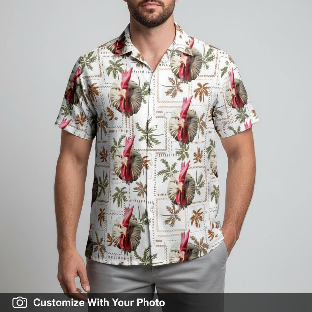 Hawaiian shirt with rooster face print worn by man with palm leaves sunset