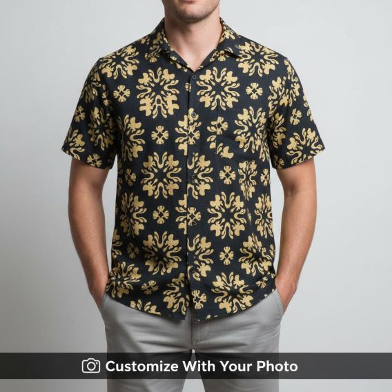 Man in black and yellow vintage Hawaiian shirt featuring bold floral motifs