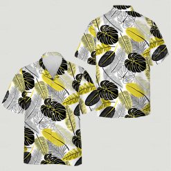 Matching cat and women's Hawaiian shirts featuring large monstera leaves in black, white, and yellow