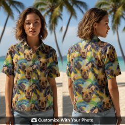 matching hawaiian shirt with dog faces and palm leaves worn by woman on beach