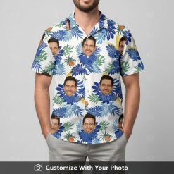 Man in blue and white Hawaiian shirt featuring custom face print and orange fruit accents
