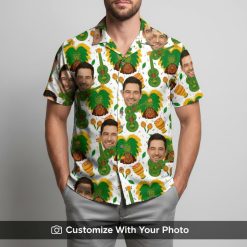 Man in funny custom face Hawaiian shirt with yellow palm and maracas print smiling