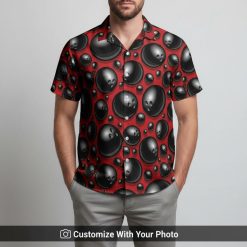 Man in stylish red black bowling shirt featuring repeating black bowling balls