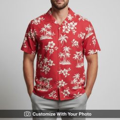 Man in red Hawaiian shirt featuring white palm trees and hibiscus floral summer print
