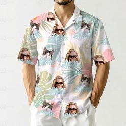 Custom tropical floral print shirt displaying person face cat face among pink leaves
