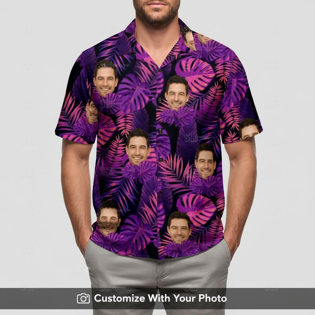 Man in black and purple Hawaiian shirt with custom face and large pink leaves