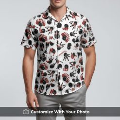 Man in bowling-themed Hawaiian shirt decorated with bowling pins, balls, and gloves