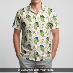 Man wearing cartoon parrot pirate Hawaiian shirt with tropical graphics on vacation