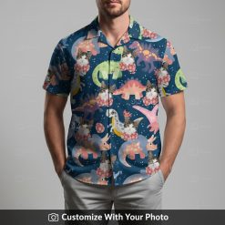 Man in cat Hawaiian shirt featuring cartoon dinosaurs and colorful mushroom design
