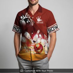 Man sporting personalized bowling shirt with bold bowling ball and pin graphics