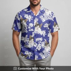Man in custom cat face Hawaiian shirt featuring blue flowers and palm leaves