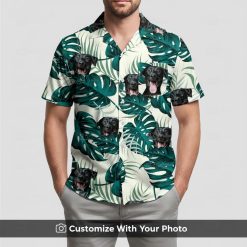Man in white and green Hawaiian shirt with custom dog face and large green leaves