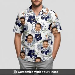 Man in custom face Hawaiian Aloha shirt with dark blue, white, and green floral print
