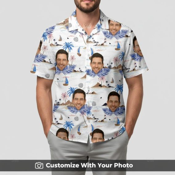 Man wearing vintage Hawaiian shirt with custom face, blue palm trees, and sailboats