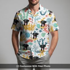 Man in custom Spongebob Hawaiian shirt with yellow dog face and tropical sea designs