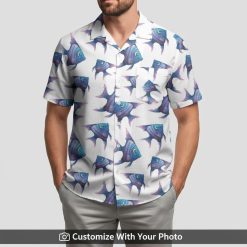 Man in tropical fish aloha shirt with blue and purple hues, island style clothing