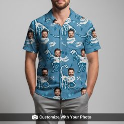 Man wearing blue funny Hawaiian shirt with white dinosaur skeletons and custom faces