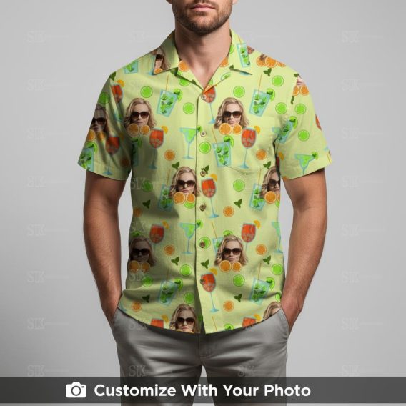 Man in green Hawaiian shirt featuring cocktails, custom face with sunglasses, citrus pattern