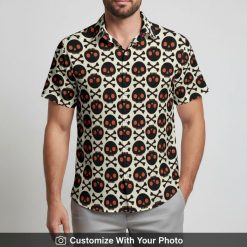 Man wearing spooky Halloween Skull Shirt featuring red-eyed crossbones on black